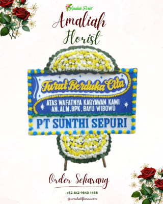 Papan Bunga Duka di Wapoga