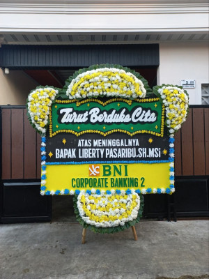 Papan Bunga Duka di Wapoga