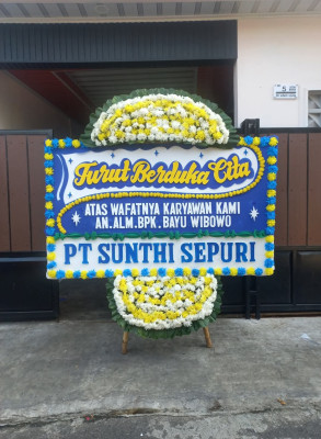 Papan Bunga Duka di Wapoga
