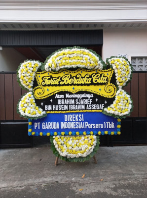 Papan Bunga Duka di Wapoga