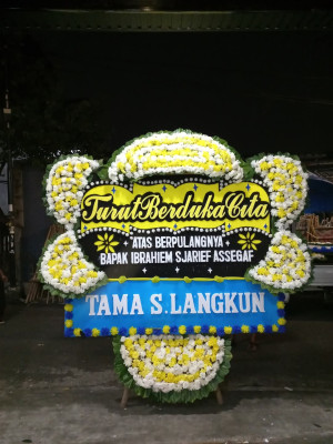 Papan Bunga Duka di Wapoga
