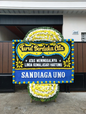Papan Bunga Duka di Wapoga